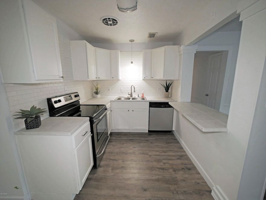 /*/*/*/ The OAK HOUSE /*/*/*/ Check out this 3BR / 1 BA home located in Forest Park. It is centrally located to all of Panama City's hospitals, restaurants, and attractions. It is 5 minutes from Panama City Beach. Roof, HVAC and HW Heater are all less than 3 years old. **Interior Features include: NEW Luxury Vinyl Plank flooring and NEW carpet, NEW paint, NEW countertops, NEW lighting, indoor laundry room.  **Exterior Features include: Spacious work shed on concrete slab and has power, HUGE backyard, registered historic Oak Tree in front yard, NEW concrete driveway that extends into back yard, NEW landscaping. (All sizes and school zones are approx. and should be verified.)