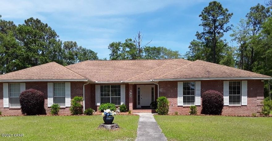 Don't miss this immaculate 4 bedroom, 3 bath home situated on over 1 acre of land within the city limits of Bonifay.  It feels like country living as the property is on a dead end street which is perfect for a little privacy.   The Florida room has a separate heating/cooling unit that makes it great for a playroom for the kids or a quiet place to enjoy your favorite beverage.  There is a workshop/garage with electricity and also has a covered porch.