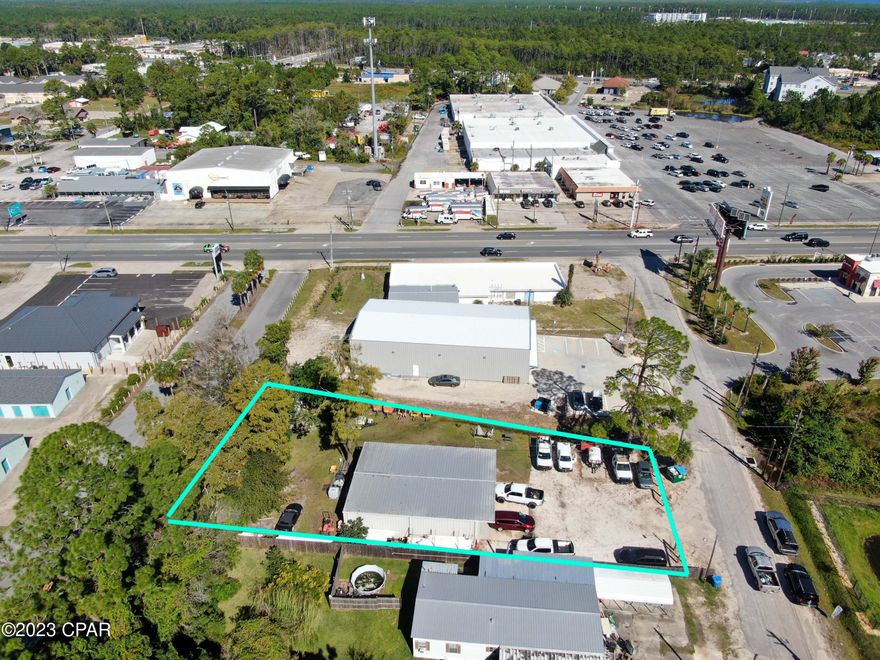 <<*UNDER CONTRACT!! --ACCEPTING BACKUPS!!* >>
Introducing an exceptional commercial opportunity, strategically located just two blocks away from the bustling Front Beach Road, this .34-acre property offers a prime business space with endless possibilities. Boasting 2200 square feet of meticulously maintained office and storage space, this property features brand-new HVAC, a hot water heater, and a roof installed around 2019, ensuring optimum functionality and energy efficiency.

Tailored for the needs of small businesses, including AC repair, plumbing, mini-storage facilities, or piping installation companies, this listing is a rare find. The property comes equipped with a fully functional kitchen, a heated and cooled office area, a full bath, and a spacious indoor storage workshop.

With its convenient location and updated amenities, this commercial space provides an ideal setting for entrepreneurs looking to establish or expand their businesses. Currently, the front road is being widened and a curb front being added that will enhance the look and value of the property as well! Don't miss this opportunity to secure a versatile and well-equipped space designed to foster productivity and growth.