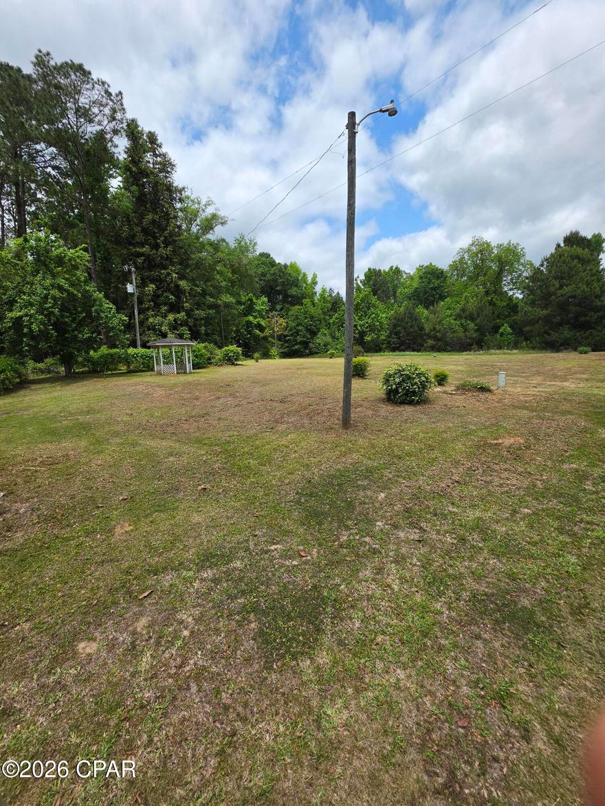 Nice piece of land with 270ft on Hwy 81. Previously a home site and appears to have a well that needs a pump and possibly a septic tank. Fruit trees and grape vines. A gazebo and a small shed. Up to buyer to do any and all due diligence. Lot is mostly cleared with grass. Priced to sell. Many possibilities with this piece.