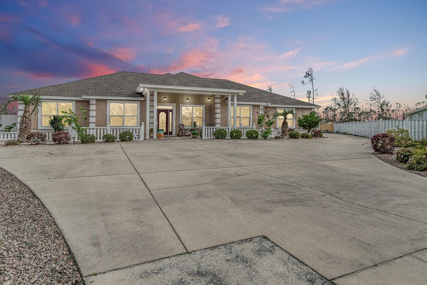 Pull up to this large estate located in the heart of town. This 4 bed 3 bath with office home sits on a huge lot with an attached 4 car garage. Sit out on the back porch and listen to the stream that runs along the back of the property line. There is an expansive Florida room that totals 420 sq ft that is not included in the heated/cooled total. This addition to the main living area provides a great place to entertain guest or just relax. Vinyl plank flooring throughout the home, except the master has brand new carpet. You can enjoy open concept living with an electric fireplace and beautiful built ins. The master has an enormous walk in closet and luxurious master bath with marble like shower and soaking tub. The 4th bedroom is a guest suite with a private bath.