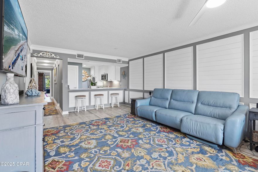 Ground-Floor Gulf-View Gem | Updated 2-Bed Edgewater Villa | No elevators

Welcome to your gem of a property ... a rare, updated 2-ensuite bedrooms, ground-floor villa in the coveted Edgewater Golf and Beach Resort, offering majestic, unobstructed views of the sparkling Gulf. This unit is a true standout, combining luxury upgrades with unbeatable convenience and saving you up to $200,000 compared to a comparable high-rise unit! Additionally, elevators are always full and/or having technical issues.... this avoids all the frustration.

Skip the stairs, ditch the elevators, and enjoy direct beach access in under 3 minutes â'' faster than waiting for the lift! Step inside and be captivated by coastal charm: designer touches like shiplap and board-and-batten accent walls, upgraded fixtures, and a kitchen perfect for entertaining. The welcoming foyer entry and thoughtfully designed open layout create a spacious yet cozy feel, while ample storage and custom organizers make for effortless living.

Enjoy the rare luxury of stepping out your back door onto a lush grassy area â'' no cramped balconies here. Watch golden sunsets melt into emerald waters right from your patio. Key updates include a new refrigerator, and new Whirlpool  washer/ dryer (2023), water heater elements replaced (2024), and an outdoor shower for easy rinse-offs after your beach strolls. Furnishings are negotiable, allowing for a smooth move-in or rental setup.

Edgewater Beach Resort is the only full-service resort in Panama City Beach, boasting: 11 pools, 4 Jacuzzis, 10 tennis courts, 5 Pickleball courts, Shuffleboard, Executive 9-hole golf course, The Magestic Lagoon Pool, The Club spa services, On-site beachfront restaurant dining, parasailing, beach services & more. 

Whether you're seeking a full-time residence, dreamy beach getaway, or high-demand rental investment, this villa checks every box. Come live where sunsets are your nightly backdrop and the Gulf is your front yard. This is your chance to own one of the best-positioned, best-valued properties on the beach.

Schedule your private tour today â'' paradise is calling!