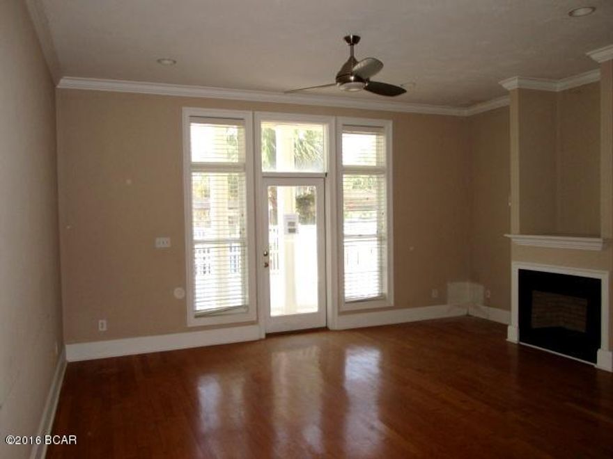 UNBELIEVABLE OPPORTUNITY to own a beach home that is only steps to the Gulf!  This three-story home features a first-floor living area with a full kitchen with an island and loads of counter and cabinet space, living room with a fireplace, and a bedroom with a full bath.  The second level has two additional bedrooms and two full baths, and the third level has a spacious room that could be used as an additional bedroom, living area or recreation room with a half bath.  This level also features a large balcony with great views of the Gulf.  The home has its only in-ground pool and a covered parking area.  Home is being sold in its AS IS condition.