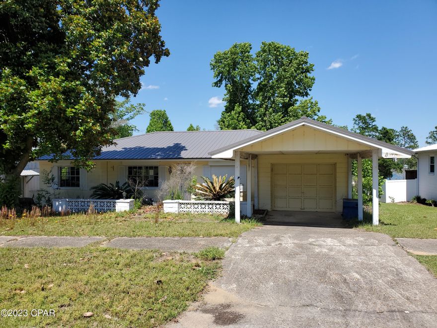 Investors special. Pre-forclosure 3bedroom. 2 bath home on a lake.  Great location in Sunny Hills Subdivision and near golf and dining. New Homes going up all around the community.  Home was vacant for several years after the hurricane. New metal roof and AC unit was replaced after the hurricane.