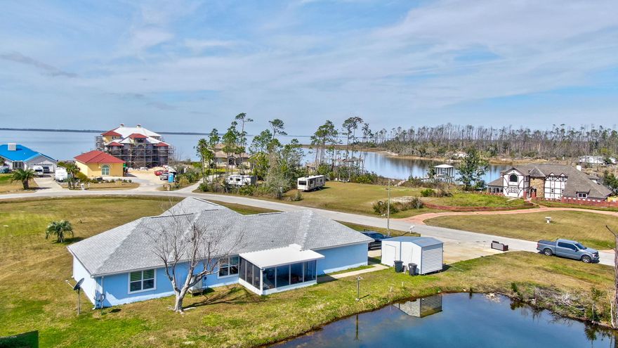 Beautiful and well maintained home in a quiet and peaceful waterfront neighborhood!  Immaculate and updated with not one but two large screened proches.  The rooms are oversized including the garage. Enjoy gorgeous sunsets out over the Bay waters.  The waterfront lot across the street is also available for $224,900 and includes .53 acres with a large dock, covered boat lift and large fish cleaning station.  This lot provides  unobstructed water leading out into the Bay and then the Gulf! (All important details should be verified by the appropriate specialist)