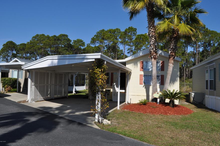 SELLER MOTIVATED! One of the largest properties in Emerald Pointe Resort!  This is a 4 bedroom, 2 bath unit with a year old roof, a brand new 14 Seer AC, and is being sold furnished.  Inside the home you'll find a very spacious living room, an eat-in kitchen with pantry, and a large Florida Room with attached laundry/storage space.  The Master Suite includes a sitting area and a private bath, the second bedroom has a closet and built-in dresser, and the 3rd and 4th bedrooms are bunk style with built-in wardrobes.  The home is near the back of the complex with no homes behind so you'll have more privacy. There is also a two car carport for parking.  Emerald Pointe Resort is a gated community with two pools (one heated seasonally), hot tub, playground, community room and more! All info is approx and must be verified by Buyers if important.