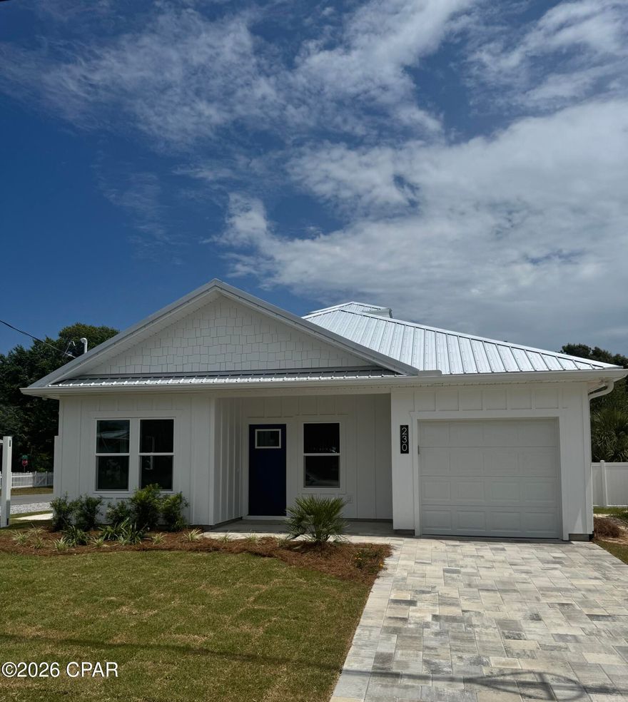 Welcome to brand new construction in the heart of Laguna Beach, the most desirable community on the west end of Panama City Beach.

Located on Jasmine Place, this home offers a rare blend of privacy and proximity to the Gulf. Set on a quiet street with no HOA, it captures the feel of Old Florida living while still being just a short golf cart ride to the beach.

Configured as a 2 bedroom with an additional bunk room, the layout allows for extra guest space and strong rental potential. The open concept design and easy flow make it ideal for full time living, a second home, or an investment property.

The home features LVP and ceramic tile flooring, granite countertops throughout, and shaker cabinets with soft close doors and drawers. The primary bath offers dual vanities, while tray ceilings in the living area add a subtle architectural touch. Additional highlights include a metal roof, high impact windows, an outdoor shower, and a private fenced patio with a paver area. Landscaped with irrigation.

The location is both peaceful and convenient. You're just minutes from local favorites like The Carousel Supermarket and Thomas Donut, along with nearby beach access points known for a quieter stretch of shoreline. 30A, Pier Park, and dining options are all a short drive away.

Whether you're looking for a primary residence, vacation getaway, or income producing property, this is a rare chance to own new construction so close to the Gulf.

Photos shown are of a similar home with the same floor plan by the builder. Updated photos will be provided once construction is complete.