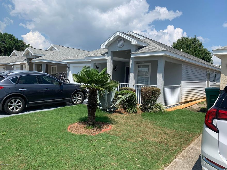 Nicely updated home in Palm Cove features new roof, old like tile flooring throughout, custom tile showers in Botha bathrooms, large screened porch in the back, etc.