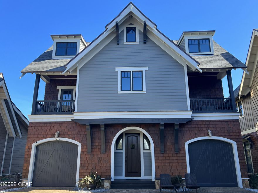 CURRENTLY UNDER CONTRACT, SELLER WILL CONSIDER BACKUP OFFERS
 Low maintenance living at its finest! This classically designed home is close to everything that beach living offers! Perfect location to be secluded, yet just minutes from white sand beaches, some of PCB's best dining options and shopping! The community pool and patio are in close proximity, yet allow privacy.

This 3-story craftsman style home has storage galore, so if you love closet space, this house is for you! There are 2 large separate garage stalls, each approximately 25' deep, allowing ample room for 2 cars, plus additional storage space, PLUS two assigned parking spaces in the driveway, allowing for parking for 4 vehicles. Quality built, solidly constructed home! Beautiful hardwood floors, granite kitchen countertops and beautiful woodwork are just some of the quality finishes in this home. HUGE laundry room!   There are no neighbors directly behind this home, just lovely wooded community property in the back yard. 

Public bay access is just outside the community gate, so it's easy to drop in a kayak or paddleboard right outside the neighborhood.

This home makes the perfect primary residence, vacation home or income property! And there is NO CARPET!