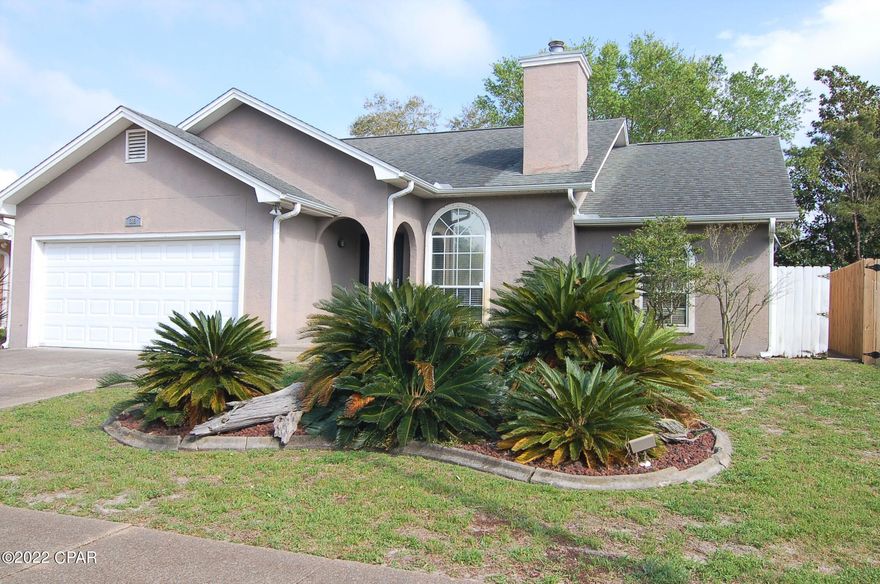 This is part of the Bid-A-Wee Community with private beach located only .3 tenths of a mile from this home.  Super location opportunity for investment or residence within walking distance to the Gulf.  No short term rentals are allowed in this area of Bid-A-Wee.   This 4 bedroom 2 bath house offers living  comfort with a large screened porch facing the backyard shade trees and entertainment patio.   The kitchen window also looks out into the calming backyard.  Master bedroom is large and connects to the dressing area with 2 closets and the bath has double sinks and shower. The entrance and living room are large with surround sound and wood-burning fireplace.