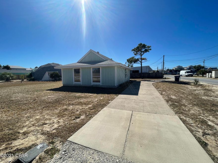 Adorable beach bungalow with excellent potential for a vacation rental investment. Two blocks to the nearest beach access and surrounded by the local favorite restaurants! New roof in 2019 & large screened enclosure! This is a chance to own a home situated on a corner lot with newly ran city sewage tap available (currently on septic). The 2 BR, 1 BA home has a spacious living and dining area, and breakfast bar connected to kitchen. The kitchen includes a stove/oven, dishwasher, and refrigerator. Two large bedrooms and bathroom with tub/shower combo. Surrounded by entertainment such as Emerald Falls Mini Golf/Arcade. You can't beat this location! Close to public boat ramps along the South Lagoon area. Don't miss this prime opportunity to invest & make a great beach house out of it! *All room measurements are approximate, please measure if important.