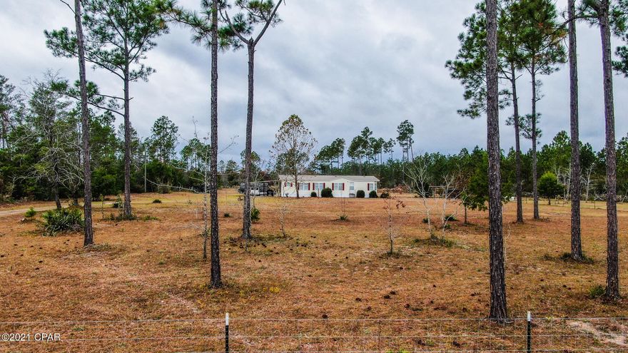 CURRENTLY UNDER CONTRACT, SELLER ACCEPTING BACKUP OFFERS Quite and Peaceful Mini Ranch/Farm perfect for raising your choice of animals.  Enjoy this large homey updated 3-bedroom 2-bathroom double wide (on foundation) mobile home which has new paint, new dishwasher, new Luxury Vinyl Plank in the great room and living room, new carpet in the bedrooms and new blinds and curtains. You can rest at ease knowing a new roof and a 4-ton AC/Heating united with new ducting was installed in 2020-2021.  New skirting was also added in 2021. A wood fire stove will warm you up in the winter and you will enjoy the 15' x 30' deck in the summer.

This property is fully fenced in with new professionally installed gate with mesh wire to contain smaller animals. There are multiple pens set up which previously Alpaca's.  Fiber lines are currently being installed for highspeed internet and cell service is excellent through Viasat.