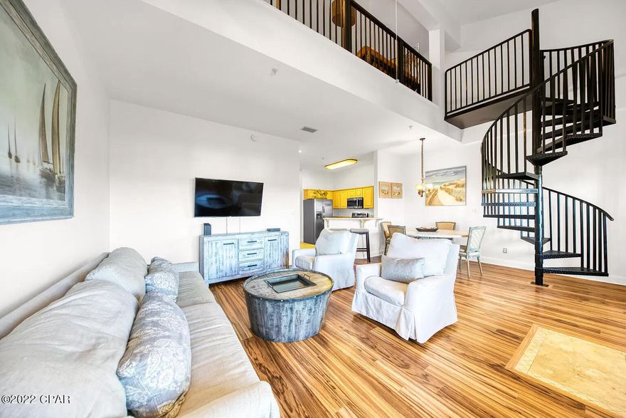 If you are someone who likes to be in the middle of what's happening, then you are going to love this condo! This condo is all about convenience and location and is located in The Plaza of Destin, a low-rise building with mixed retail on the lower level. This condo is super convenient to Destin Commons, Whole Foods, the Legendary Marina, lots of restaurants, and of course our beautiful beaches! This condo has a showstopping entrance with high ceilings, open floor plan, and spiral staircase. There are 2 master suites - one upstairs and one downstairs. There is also a bonus bunk room upstairs that works great for weekend guests. Condo is turnkey and fully furnished. No shortage of parking exists here at this condo building.