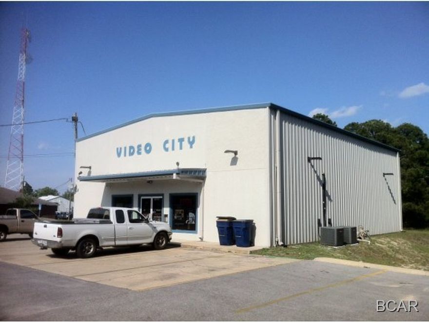 3,000 +/- SF steel structure retail building situated on 2.316 +/- acres. Centrally located on Lisenby Avenue between 23rd Street and Hwy 98 (15th Street). Located within Panama City. Zoned General Commercial.Open sales area (30' x 30'), 2 ADA restroom, kitchenette, office (20' x 20') and storage room (40' x 20'). Very versatile building with additional land for future development or ample storage yard. Concrete parking area with 10 +/- stripped parking spaces.