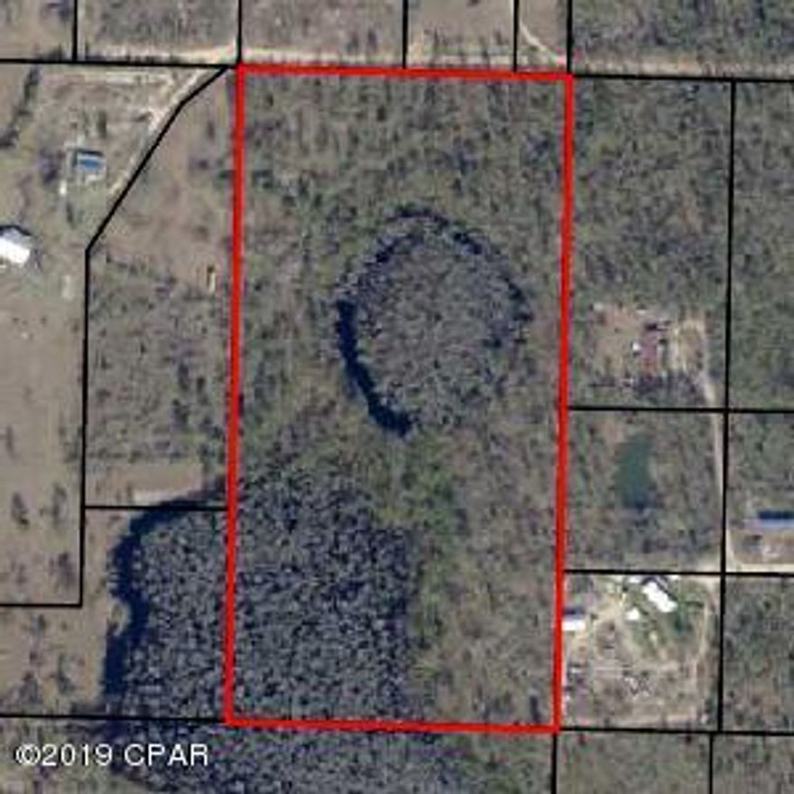 CURRENTLY UNDER CONTRACT, SELLER ACCEPTING BACKUP OFFERS. 20 ACRES -30 Minutes from town, Mobile homes allowed..room for a pole barn, horses,cows, goats, chickens & u can have a garden. There's room for all your toys(boat, RV, wave runner, & a tractor...won't last long..County Maintained road too!