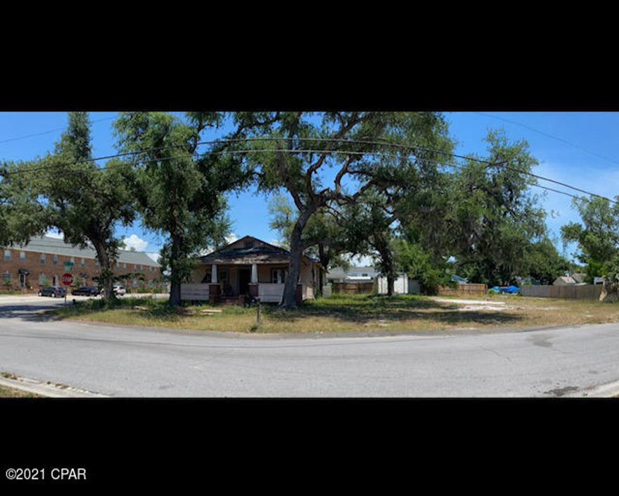 Attention Investors! This home sits on a corner lot with a large vacant lot right next door. The vacant lot has alley access. This home has quaint little homes all around. Only a block from the bay. The home needs a new roof. Selling AS IS. The home has furniture in it and it all goes with the house. All measurements are approximate and must be verified by buyer.