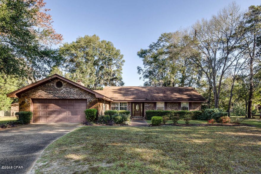PRETTY BAYOU HEIGHTS ... WATERFRONT ...Custom built brick  home.  3/2.5 with approx. 2,100 SF.  345' lakefront situated on .85 acre, flood zone X.  Excellent location ... shopping, dining, etc.   Entry foyer reflects the friendly spirit of this home ... note beautiful  lead glass in front door. Brick fireplace in Great Room adds a cozy note on those chilly winter evenings.  Just outside Great Room is Sun Room with windows with complete water view. Great Living Room/Dining Room Combination with water views.  Kitchen has natural wood cabinets ... Corian counter tops ...  tile floor ... built in desk with shelves ... functional balance of comfort and convenience. Master Suite has loads of closets ... private bath with updated fixtures and vanities ...and door to backyard. Inside laundry/utility room with 1/2 bath.  Large attached garage with storage galore. Lots will be graded and seeded with Winter rye. Home has outside building for storage and pump.  NEW ROOF INSTALLED.