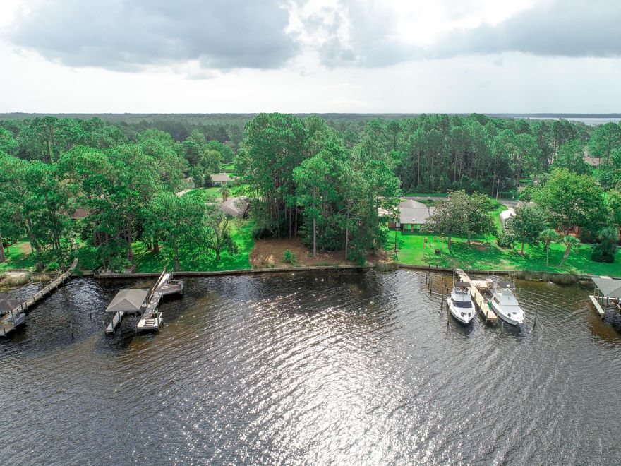 Waterfront lot in very desirable subdivision of Plantation Point. Lot is high and dry, has very good water 5-6 ft. 50 ft. out, good views, and a very well established neighborhood. Property also has an existing sea wall. Perfect location for your new waterfront home. Your five minutes to the Intercoastal Waterway, 20 minutes to Panama City, 25 minutes to the Gulf of Mexico. In the protected waters of Callaway Bayou. Looking for a building lot on the water, look no further.