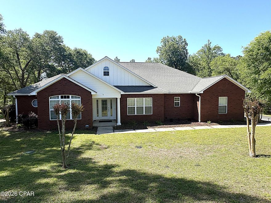 Come check out this beautifully remodeled 3BR/2BA Energy Star Certified home in the well-established, quiet neighborhood of Meadowview Estates. Inside is a beautiful open floor plan with Luxury Vinyl Wood flooring throughout the main living areas and new carpet in all 3 bedrooms. The kitchen and two of the bedrooms have direct access to the rear covered porch. The kitchen has Kraftmaid white maple cabinets with beautiful quartz countertops. The bathrooms have Kraftmaid maple cabinets and granite countertops. The master bathroom has separate his and her vanities, separate walk in closets, a jetted tub and a tiled shower. In the family room, there is a ventless, thermostat controlled propane fireplace. New A/C in 2022 (16 SEER units, compressor & AHU with Ecobee thermostat). New submersible well was installed in 2016.  All appliances, including the washer and dryer, convey with the home. The home is located very close to Citizens' Lodge, DaySpring Christian Academy, Marianna K-8, Marianna High School, Marianna Mere (Sports Complex) Chipola College, Florida Caverns State Park, Chipola River boat landing and the downtown area. All the streets dead end and great for walking or riding your bike. BONUS!!The 28'x30' detached garage is finished with a wind rated garage door and jackshaft drive opener, beaded plywood ceiling, pegboard walls, and ceiling/wall fans, great for a shop or hobbies. It also has a pull down attic access to the floored storage space and a 30 amp plug/breaker for RV hookup..