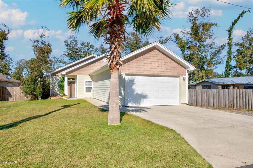 CURRENTLY UNDER CONTRACT, SELLER ACCEPTING BACKUP OFFERS. This home is not like the others being built daily. A true custom 3 bedroom 2 bath home with a split floor plan. The living room is open with cathedral ceiling, gorgeous built in bookcase, inserts and gas fireplace. The floors are manufactured laminate wood and custom tile. The kitchen features Corian counter tops, custom cabinets, breakfast bar and large pantry.  The master bedroom is spacious and master bath has large walk-in closet, double vanity, separate jacuzzi tub and shower. The other two bedrooms have a large bath in between. This home is conveniently located around the corner to a public boat ramp for folks that love boating and being close to the water The backyard is completely fenced-in with lovely shade trees and plenty of room for a fire-pit, swing set, or gardening. THERE IS NO HOA here and no monthly fees.  Other features are a 2-car garage, attic storage, and a double-gate for boats, and other water craft. The home is located in FLOOD ZONE X and is just minutes to Southport elementary school and is in a low traffic area for children to play. Make an appointment to see this lovely home and you WILL NOT be disappointed. This special price is only being offered for the first 10 days to all buyers. The home may qualify for 100% rural development USDA financing.