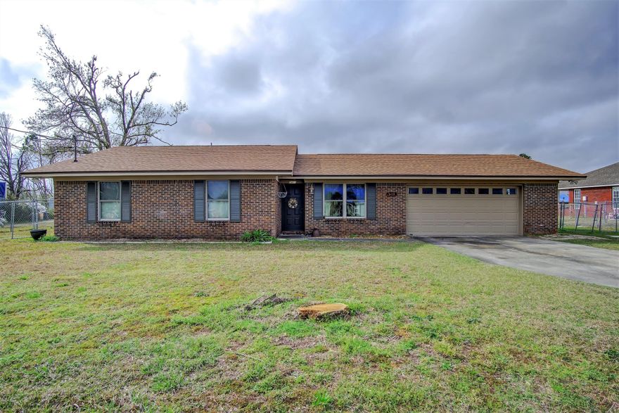 Very nice, super cute, all brick, move in ready 3 bedroom, 2 bath home on 1/2 acre. Open floor plan, living room and family room with wood burning fireplace. New roof, new interior paint, all hurricane repairs almost completed (just finishing repairs in the garage)! Real wood cabinets in the kitchen, side by side refrigerator, smooth top stove - kitchen also has a pantry, great storage.  Large hall closet for overflow!    Bedrooms are large enough and also feature decent closets for the square footage. Attached 2 car garage.  There's even a shed in the back yard!  Priced to sell! (all sizes approximate and taken from public records, buyer to verify any details buyer deems important).