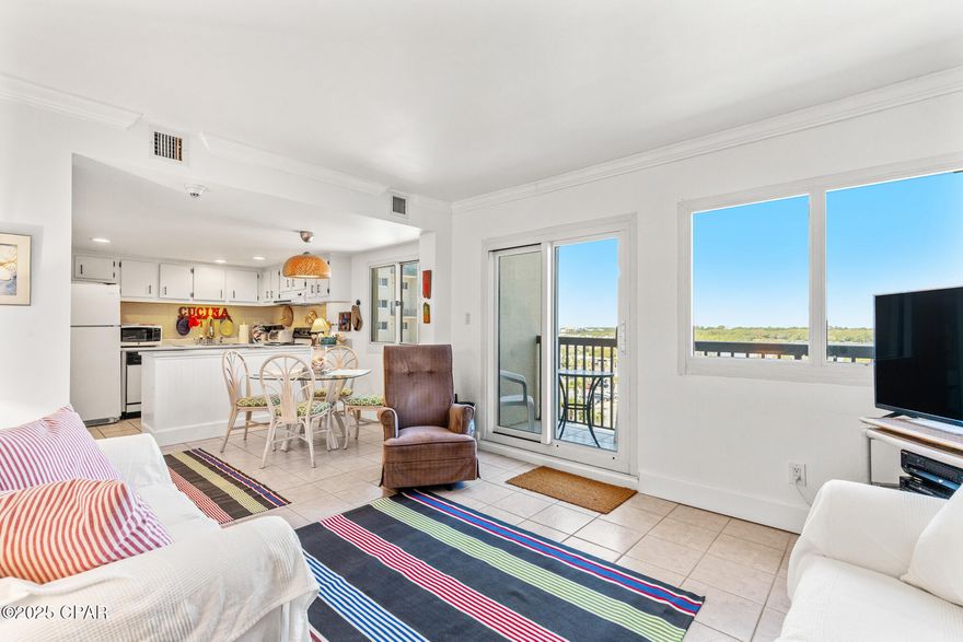 'CURRENTLY UNDER CONTRACT, SELLER WILL CONSIDER BACKUP OFFERS'. 
Townhome condo located on the 5th floor with spectacular view of Lake Powell  from the living room and Gulf of Mexico from the bedroom.   This 2 bedroom 2.5 bath condo is a comfortable and cozy place to stay and relax.  TheMaster Bedroom has an ensuite bath and a private balcony overlooking the Gulf and its sandy white beaches.  The second bedroom has a Lake view.  A great get-away for those who want quiet relaxation  and a beautiful beach.   Pinnacle Port is nestled in between Panama City Beach and the 30A area and just a short drive to Pier Park and its dining and shopping but also a short drive to 30A with its unique shopping and dining experiences.    
Pinnacle Port is a gated community with its own boat ramp and boat docks leading out to pristine Lake Powell (the State of Florida's largest coastal dune lake), bocce ball, pickle ball, shuffleboard, tennis courts, basketball court, grills on each end of the property and two pools.
NOTE:  Some personal property does not convey.