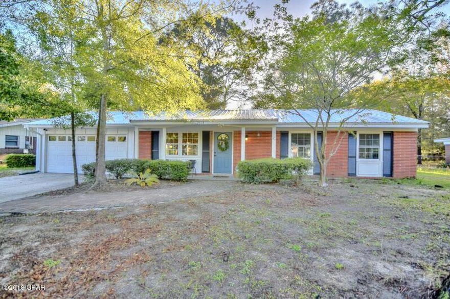 Move-in ready, updated 3/2 in desirable Forest Park! You will be taken aback by how cozy this home is. It has been given so much TLC,it truly shows as soon as you enter. There are many new appointments throughout-custom built faux fireplace with reclaimed cedar mantle,bonus room was converted into a cooled 2 car garage,all new windows,new front door,exterior and interior doors,updated door and window trim throughout,new fixtures and hardware throughout,new barn door,vanity,and resurfaced ceiling in master bath,just to name a few. From the large eat in kitchen,walk out the french doors to the arbor-covered brick patio with globe lighting,and relax at your fire pit. Fantastic for entertaining! Metal roof installed in 2014. All measurements are approximate. Please measure if important.