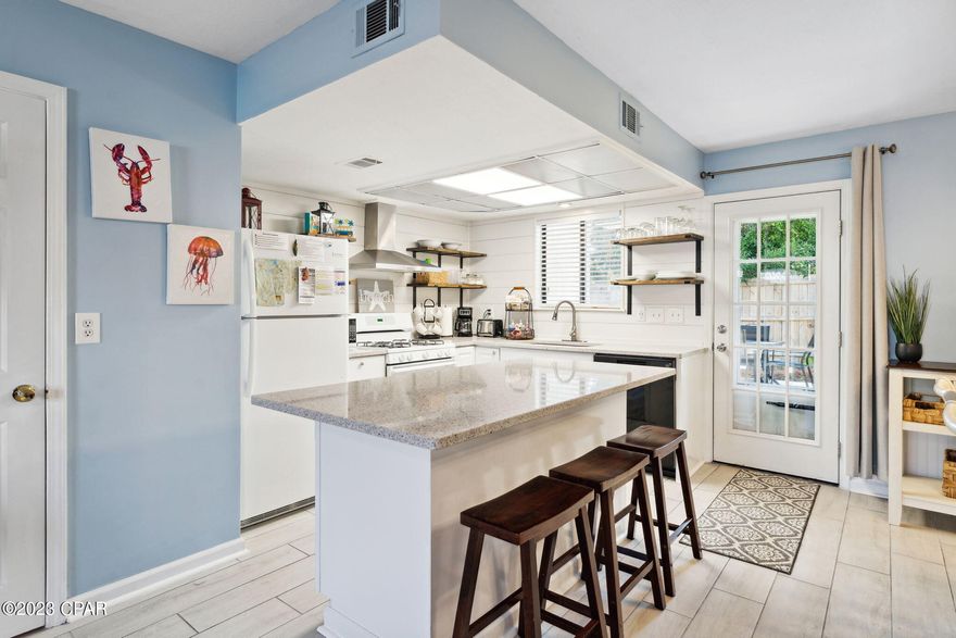 CURRENTLY UNDER CONTRACT, SELLER WILL CONSIDER BACKUP OFFERS Welcome! This delightful property offers a fantastic opportunity to own a beautiful home in a highly sought-after community. Nestled in a prime location, this attractive townhome has been updated with all new granite countertops, solid wood cabinets, beautiful accent shiplap, tile flooring, fresh paint, furniture and accessories etc. New HVAC and water heater in 2021. 2 spacious bedrooms upstairs and a full bath. STR allowed with amazing projected ROI! 2 assigned parking spots in front of the unit. The outdoor living spaces are equally impressive. Step out onto the spacious patio and take in the warm Florida sunshine or enjoy a refreshing drink while overlooking the lush greenery surrounding the property. You'll have access to a range of fantastic amenities. Enjoy a refreshing dip in one of the community pools, challenge your friends to a game of tennis or shuffleboard, or take a short stroll to the pristine sandy beaches for a day of sun and surf. Whether you're looking for a permanent residence, a vacation home, or an investment property, this is an incredible opportunity not to be missed. Give me a call TODAY! HOA includes: 11 pools(5 heated), shuffleboards, beach house/café, mini golf, exercise room, tennis courts, playground, WIFI, cable, pest control, termite bond, trash, ground keeping, property patrol, gated community etc