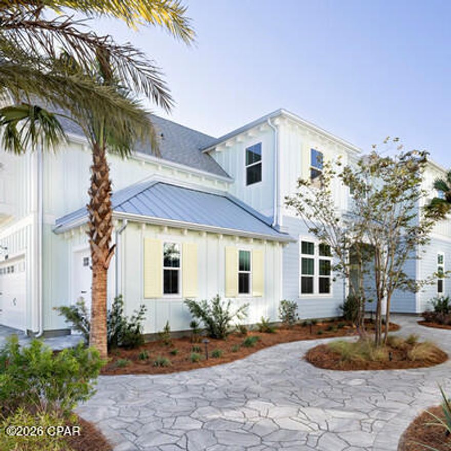 Discover the Grand Spinnaker in the Vista Collection at Latitude Margaritaville Watersound, featuring a thoughtfully designed layout and professionally curated interiors that blend coastal style with everyday comfort.  This open-concept floor plan offers a spacious kitchen overlooking the dining and great room, ideal for entertaining or relaxed living. Designer-selected finishes and cohesive interior details create a bright, modern feel throughout the main living areas.  The private primary suite serves as a peaceful retreat with a well-appointed ensuite bath and generous walk-in closet. Guest bedrooms and a versatile den provide flexible space for guests, a home office, or hobbies. A covered outdoor living area invites you to enjoy Florida's coastal breezes year-round right off the intercoastal waterway.  Located in Latitude Margaritaville Watersound, residents enjoy unparalleled amenities including a vibrant Town Center, resort-style pools, fitness and wellness facilities, pickleball, walking trails, live entertainment, and a full calendar of activities--just minutes from the Emerald Coast's white-sand beaches.