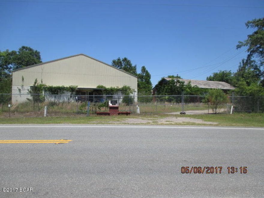 Almost 8 acres of Commercial Land close to HWY 231 on the Florida Alabama Line!  This property has 3 older buildings that once was the Campbellton School.  The building could be used for storage or possible small manufacturing but they will need updating and renovations.  The property is completely fenced.  Bring us your idea and see if this property will work for your business!