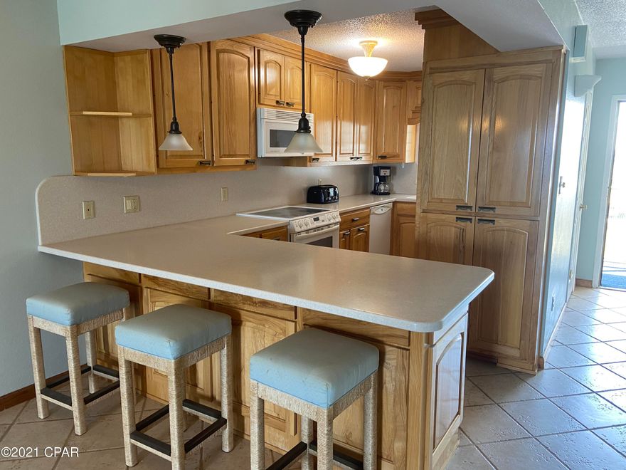 2 bedroom/2 bath condo with a gorgeous view of the Gulf.  Rare opportunity to own a non-rental unit that has been well cared for with updated  tile flooring and beautiful kitchen with corian countertops .  Entire unit was just painted with beachy and tranquil sea salt color throughout.  Regency Towers is a family friendly resort and the amenities include 2 large waterfront pools, fitness center, 500 feet of beach access, pool side  Bikini Bob's Tiki Hut for food and adult beverages as well as 24/7 security in a gated community for extra privacy.  This would be a great 2nd home or rental investment. Call your favorite realtor and let them show it to you TODAY in person or virtually. **will post more photos soon