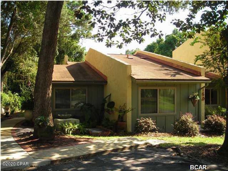 PLEASE WATCH VIRTUAL TOUR AS SHOWING. Great location in the sought after Delwood Estates, which is in the middle of Panama City where everything is just minutes away. Large, beautiful town home one story end unit very private with 3 bedrooms, 2 baths,is in move-in condition. Outdoor living abounds with a spacious screened porch, brick paver patio, private setting ready for BBQ! Split Bedrooms offer privacy inside as well. Complex has gorgeous oak trees, a pool, a steam room, two tennis courts and a clubhouse which is available for parties. There is also an area in which to park RV's, trailers and boats at no charge. All areas of complex that are not fenced are maintained by the complex Association.