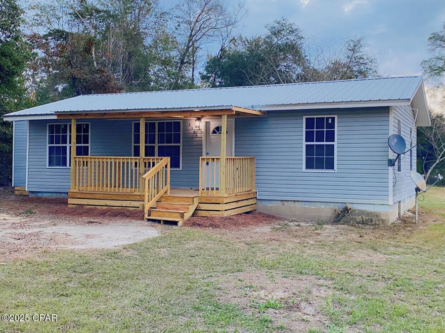 Conveniently located between Marianna and Grand Ridge this beautifully updated 3-bedroom, 1-bath house on blocks with crawlspace offers modern comfort in a desirable location. Featuring brand-new stainless-steel appliances, a new AC system, durable vinyl plank flooring, and fresh paint throughout, every detail has been thoughtfully remodeled. Sitting on a manageable piece of land, it's perfect for those who want outdoor space without the upkeep. Move-in ready and waiting for you to make it your forever home!