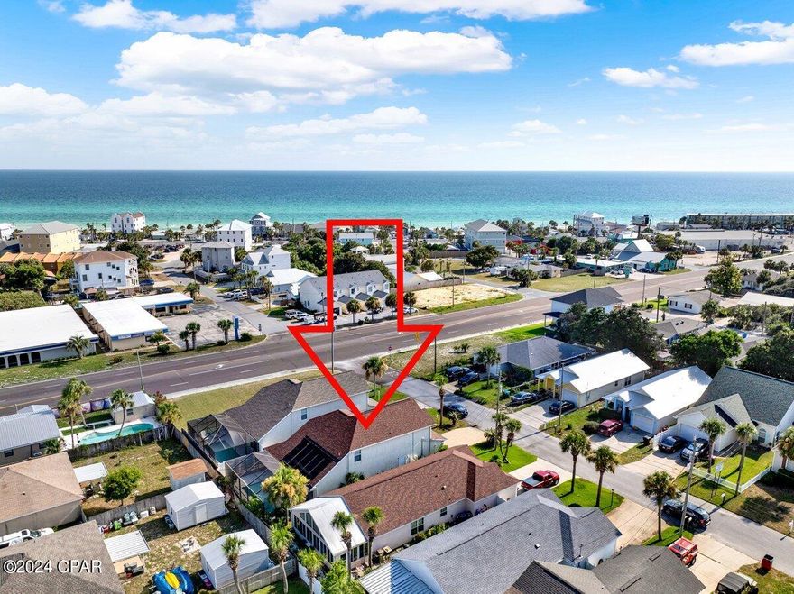 ***UNDER CONTRACT, SELLER ACCEPTING BACK UP OFFERS*** What an incredible opportunity to get such an affordable, spacious pool home, so close to the Gulf!  You could easily walk the couple blocks to the beach, come back and take a swim in your inground, enclosed pool, or enjoy a walk through the neighborhood.  Fully paid for solar panels installed in April of 2015 will keep your electric bills nice and low.  Ask your Realtor for documentation on the solar panels, it is in the listing.  This home is very spacious, featuring first floor master bedroom, with trayed ceiling and a large ensuite bathroom.  The outdoor living area features a recently serviced  enclosed pool, where seller invested $1500 in pool upgrades including pool being completely drained, pressure washing the entire surface, filled again, and sand changed out in the pool filter.  HVAC was installed June of 2019 and is still under the 10 year parts warranty for 5 more years.  Roof is 4.5 years old.  House can be bought fully furnished as furniture is negotiable or if you prefer the furniture to be gone, estate sale by appointment has been lined up.  In addition to the spacious and open living room and kitchen, you have a dining room, half bath and very generously sized laundry room.  Upstairs features 3 bedrooms and a bath, with one of the bedrooms having a vaulted ceiling.  While there is some room for updating, such as the carpets, this home has been priced where it will not last, so don't wait! (Property lines shown in the drone shot are not to be construed as a land survey, for exact property lines, please have a land survey).