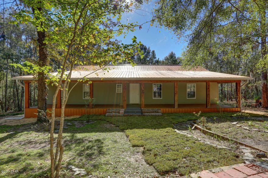 If you are looking for plenty of room to stretch inside and out? You have found it!!!!! You must see this large beautiful home nestled back at the very end of a cul-de-sac.!!!! This home butts up to over 1400 acres of Deltona land that may be hunted with a permit. As soon as you pull up to this private sanctuary the first thing you will notice is this home's BEST feature, a very large front porch that runs the full length of the house!!!! Absolutely stunning!!!!every room in this home has new paint and new flooring. The seller has priced this home so low so that the buyer can choose how to finish the kitchen, or with an acceptable offer the seller can install a refrigerator and stove. The possibilities with this home is unlimited!!!!! There are two boat landings very close to this property! This could be your dream home!!! ALL SIZES ARE APPROXIMATE PLEASE VERIFY!!!!! SELLER IS OFFERING A $5000 ALLOWANCE TO FINISH THE KITCHEN HOW THE BUYER CHOOSES..WITH AN ACCEPTABLE OFFER!!!!