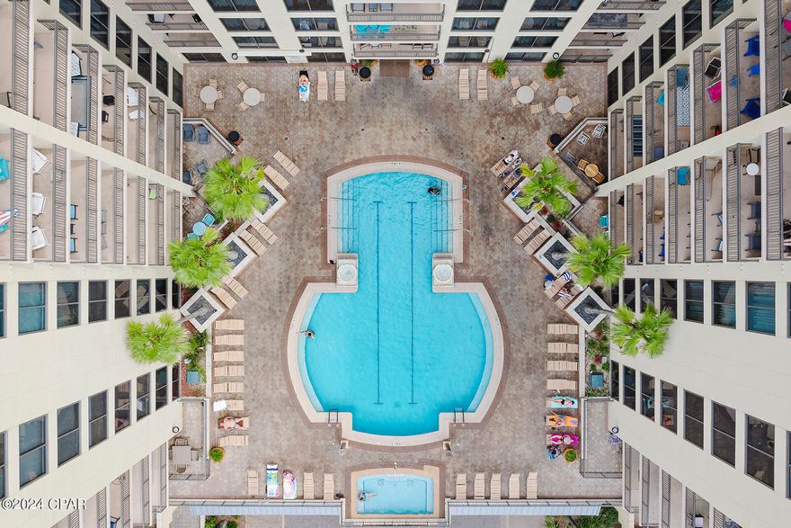 Back on Market! No fault of the seller. Welcome to Origin At Seahaven unit 507! Exquisitely remodeled to complement the jeweled-tone hues of the Gulf of Mexico, this unit offers gorgeous accommodations with sweeping coastline views! Enjoy the view from your bedroom and for fresh air, there is a private balcony off the living room, providing all the action you desire. It's close enough to see dolphins in the Gulf, fireworks from the Panama City Beach Pier or the Pier Park carousel. For privacy, you have remote controlled window treatments and dimmable chandeliers help set the mood. There are plenty of sleeping options including an Italian-made 'everyday sofa bed' and bunk beds situated in the living room. Enjoy many updates, including new appliances, LVP flooring, fresh paint and furniture.

In addition, Origin at Seahaven offers an array of amenities, including the Grand Terrace Pool, an arcade, multiple grilling locations, a twenty-four-seat movie theater, and a fitness center! Don't forget the Saltwater Marketplace at the lobby level, which includes a Starbucks. On your way to the beach access directly across the street, enjoy beachside meals and drinks at the famous Sharky's beachfront restaurant!
Take advantage of this opportunity to truly own a piece of paradise. Book your showing today!