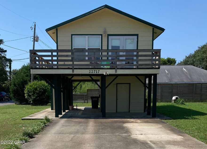 ***MULTIPLE OFFERS RECEIVED-OFFERS CONSIDERED UNTIL 1PM JUNE 27th*** 3bd, 1.5 ba corner beach house within walking distance to both Lake Powell and the beach! 2017 metal roof, 2021 A/C, septic system recently serviced. New fixtures, kitchen plumbing, ceiling fans, and upstairs lighting. Blackout shades on windows and doors. Living room fireplace(bedroom fireplace does not convey). Ample storage underneath stairs. Home will require some updating but at this price it is a steal! All information is approximate and should be verified by buyers if important