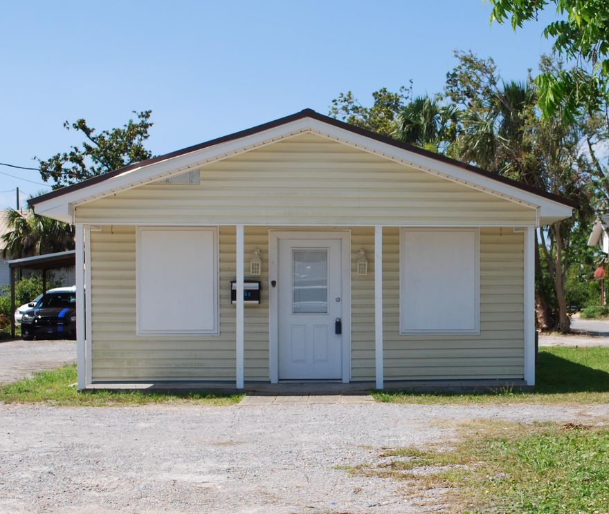 ''CURRENTLY UNDER CONTRACT, SELLER ACCEPTING BACKUP OFFERS''. This charming office building is centrally located in downtown Panama City between Jenks and Harrison Avenues.  The open floor plan features tile floors throughout, 2 half bathrooms, and a kitchen area with room for storage. There is also a 24x12 storage unit with an attached carport, climate controlled and has a ceiling fan. The executive furniture and décor is included with the building. In addition, the property is located in a multi-use zone and can be used as a residence. I have included a list of the furniture and the zoning information in documents.