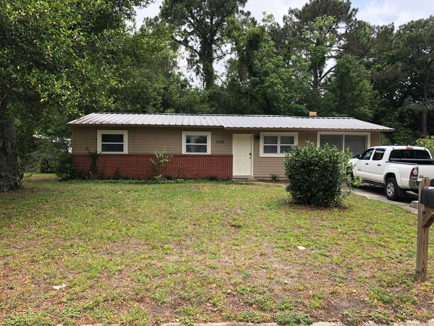 The epitome of CUTE and COZY! This centrally located home is close to everything. Short drive to Gulf Coast State College, shopping and beaches. Hardwood-look laminate floors, original solid wood cabinets, with updated tile and appliances. This home is in move in ready condition. Many upgrades have been made including a recent new metal roof, new AC and new plumbing in the laundry room. All measurements are approx, please measure if important.