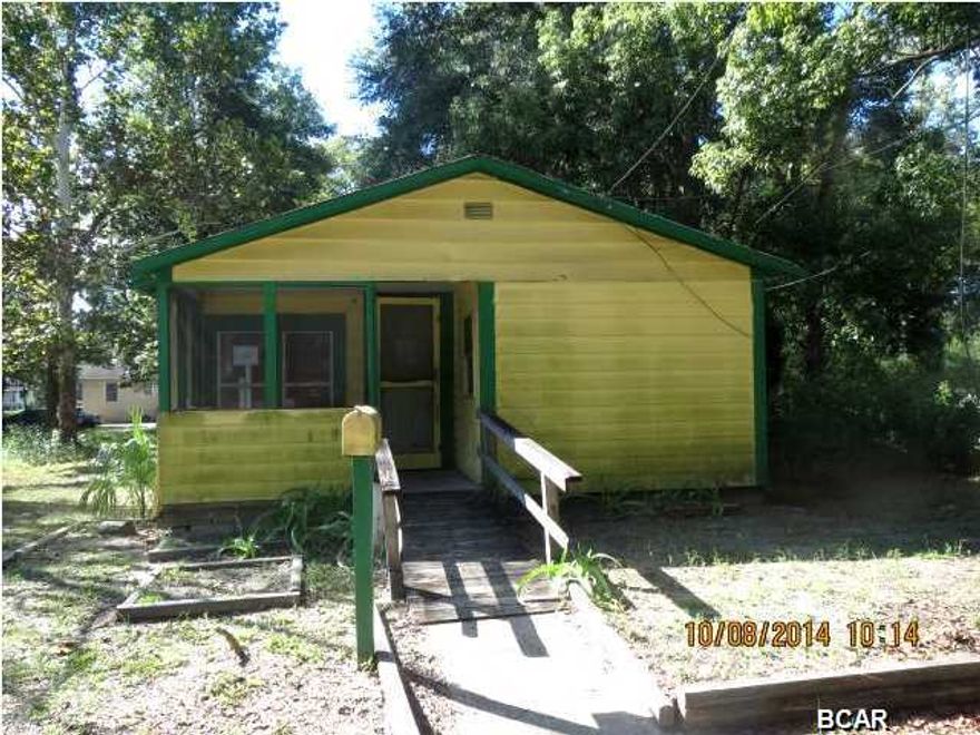 HANDY-MAN SPECIAL! Within walking distance to the Downtown area, this three-bedroom home needs work, but it has a loads of possibilities. The home has a large storage building in the back of the house that would be great for a small shop. Home being sold AS IS.