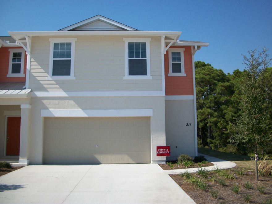 THE BEST OF BOTH WORLDS! Nestled within a wildlife conservation area on the right and rear sides of the home (ideal views from the living room and bedrooms), this woodland-view home is located less than a mile to the beautiful beaches. This well-designed home was created for easy living with a master bedroom, en-suite and laundry room on the first floor. Also on the first floor are the living room, kitchen, and powder room. Upstairs, there are 2 large guest bedrooms, a second living area and a guest bathroom. Many features in this home have been upgraded, including the large, diamond pattern tile floor in the living area and kitchen, granite countertop in the kitchen, corian counters in the bathrooms, stainless steel appliances, shelving in the garage, and beautiful landscaping all around. There is also plenty of storage throughout the home, with an over-sized pantry, walk-in closets in each bedroom, coat/broom closet downstairs and a linen closet upstairs. The 1.5-car garage has enough space to store an SUV and a golf cart or a motorcycle. The outside has additional landscaping added throughout the years. The HOA covers all lawn care, irrigation, exterior maintenance and roof maintenance of the home, as well as maintenance and access of the common areas and pool/cabana.