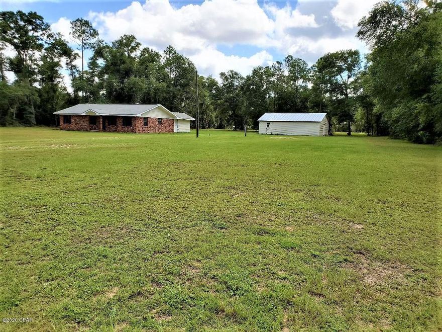 Want space? How about a ranch home on 3 acres with a separate 600+ square foot apartment, workshop and covered area for your mower, boat or projects! The main house has 3 bedrooms and 2 bathrooms, with an office or nursery off of the master suite. The kitchen has quartz counter tops and a new tiled back-splash, while the living room has a cozy fireplace and the house is even wired for surround sound! Have a parent or your adult living with you? Give them their own apartment, rent it out to offset your payment or use it as your own business space...the opportunities are endless. There are his and her closets in the master bedroom with sliding barn doors! The laundry room is huge! This house offers so much for the money, you really owe it to yourself to come and check it out in person.
