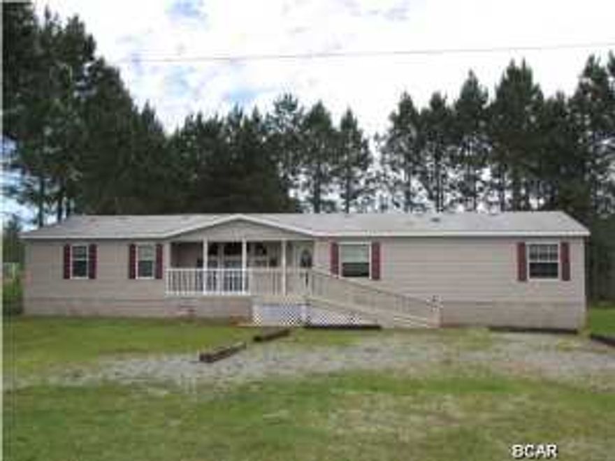 WOW ! WHAT A BEAUTY ! This 4 Bdr 3 Full Bth 2008 Nobility Triple wide with over 2200 Sq Ft is Clean and Neat as a pin. Completely Renovated to like New Condition. Conveniently located just off Hwy 231 in the Fountain area only 25 minutes North of Panama City. SELLER FINANCING is available depending upon review of Credit Application. Home is newly renovated with Freshly painted walls, New Carpet in Bedrooms, Living Room, and Den, New Vinyl in Kitchen, Baths, and Laundry. Covered Front Porch opens into Large Open Living Room with lots of windows and Dining room with Built in China Hutch. Very Nice Kitchen with Double Door Refrigerator with ice maker, tons of cabinets, new counter tops, Built in Pantry, Work Desk, Breakfast area with Sliding Glass Doors opening onto Deck. Laundry Room