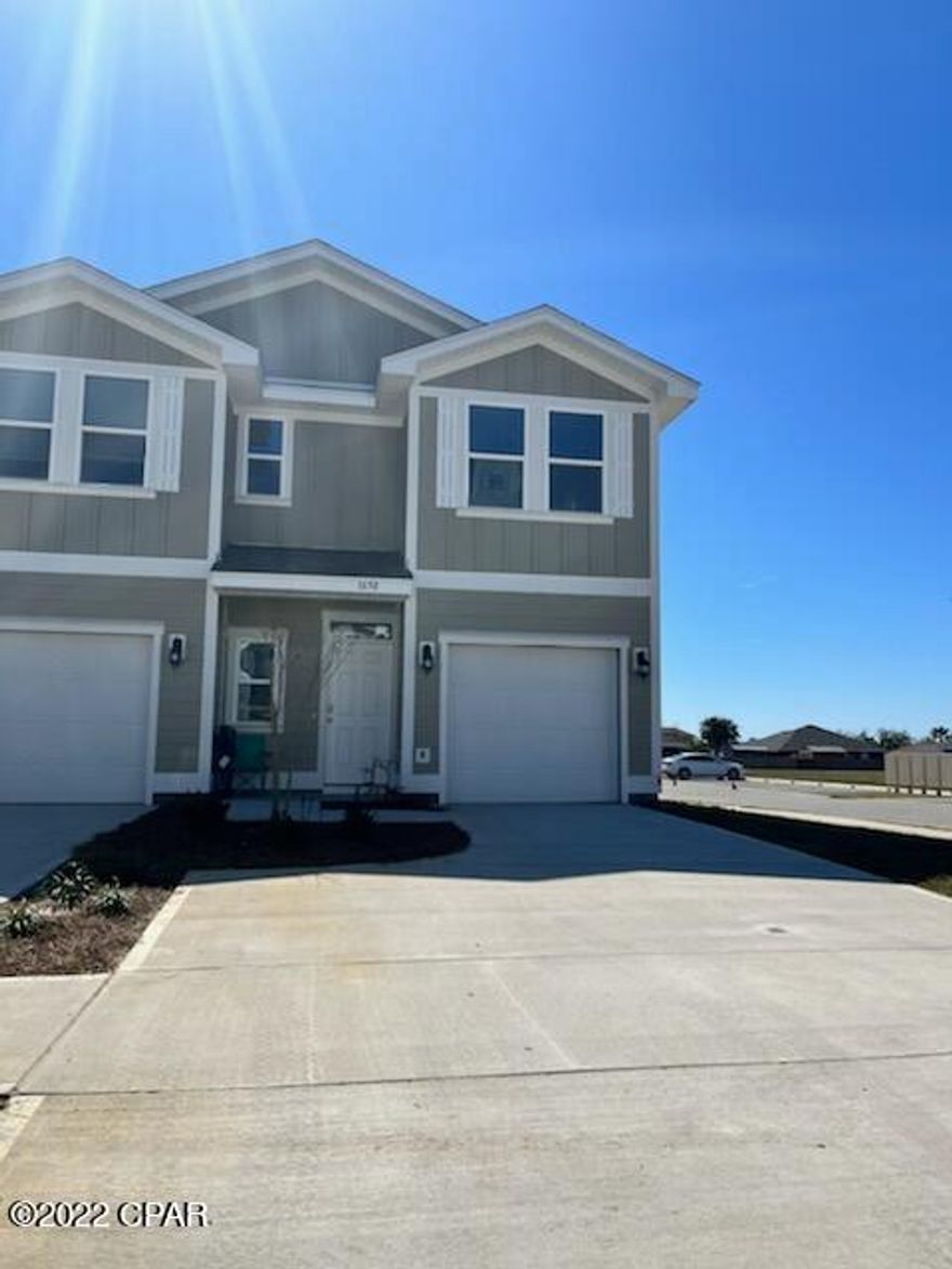 The Palm floor plan is a 3 bedroom, 2.5 bath townhome. As you enter, the long entry leads to an open living and dining area. The kitchen has a breakfast bar and is an open concept. This plan features a single car garage and all bedrooms are on the second level. Bedroom 1 has a large bath with walk-in shower and glass door as well as a walk-in closet. The additional bedrooms are situated at the back of the townhome as well as a full bath and laundry area. This is our newest townhome community and it is centrally located in Lynn Haven. 



** Up to $10k in closing costs when using seller preferred lender with contracts executed by 1/23/2022 closed no later than 2/23/2022. Buyer does not have to use the preferred lender, only to receive closing cost promotion. ** This home comes standard with a Smart Home Technology package which includes a KwikSet keyless entry, Skybell doorbell, automated front porch lighting, an Echo Dot device, and Quolsys touch panel which can be integrated to control your lighting, thermostat, front door and so much more. 

This home is being constructed with the Zip Sheathing system, providing greater protection than a traditional housewrap from damages due to wind, rain, and extreme weather. A builder 10-year structural warranty is also included.

Pictures may be of similar, but not necessarily of subject property, including exterior and interior colors.