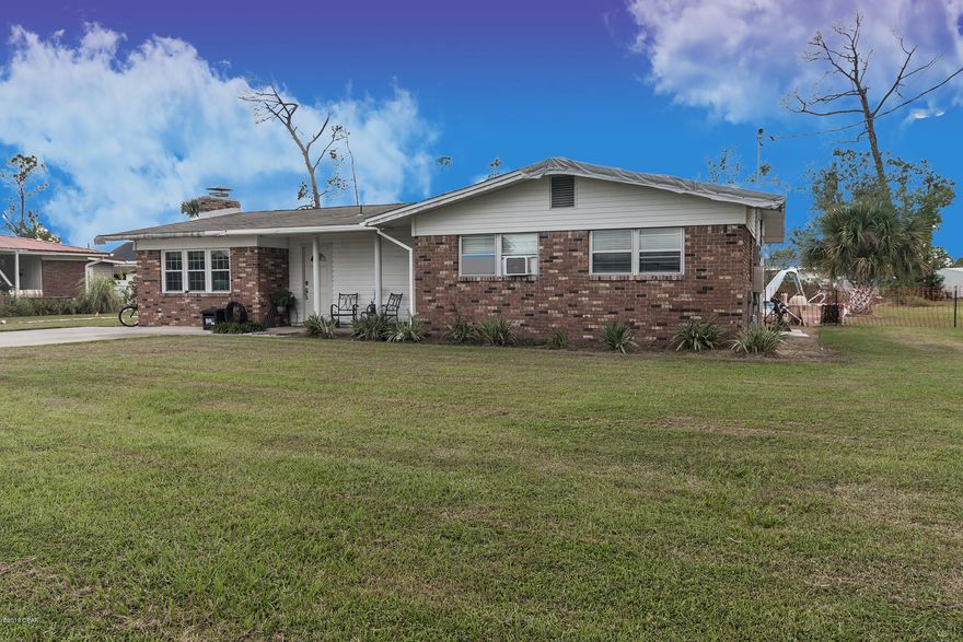 CURRENTLY UNDER CONTRACT, SELLER ACCEPTING BACKUP OFFERS. Fantastic Lynn Haven Pool Home on 1/3 acre lot!  Next to Lynn Haven Elementary, walk to parks, the bay, and downtown Lynn Haven!  Owner is selling as-is, complete this home to your liking.  All pics are post Hurricane, beautiful home has recessed lighting, tray ceilings, kitchen island, Reme Halo whole home air purifier, Rinnai tankless water heater, the list goes on. Home tarped immediately and still needs a roof, the master bathroom was gutted before the storm and needs to be finished.  Full Price offer includes new materials for master bath (vanity, mirrors, and lighting), large insulated and cooled She-Shed/Workshop with 40 Amp Service, Tri-Fuel 11k Watt Generator, and natural gas grill plumbed to home.