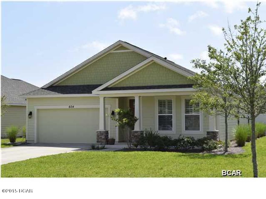 Breakfast Point - This is a like new home located in the Breakfast Point subdivision. Located just a block from Breakfast Point school, and just a short walk or drive to Publix, Home Depot, and several restaurants....great location! This home was painted just a year ago, and features all tile floors, open kitchen/dining and living room, fenced back yard and large covered patio. There are granite counter tops through out, double vanity in the master bath, and upgraded plantation shutters through out the house.