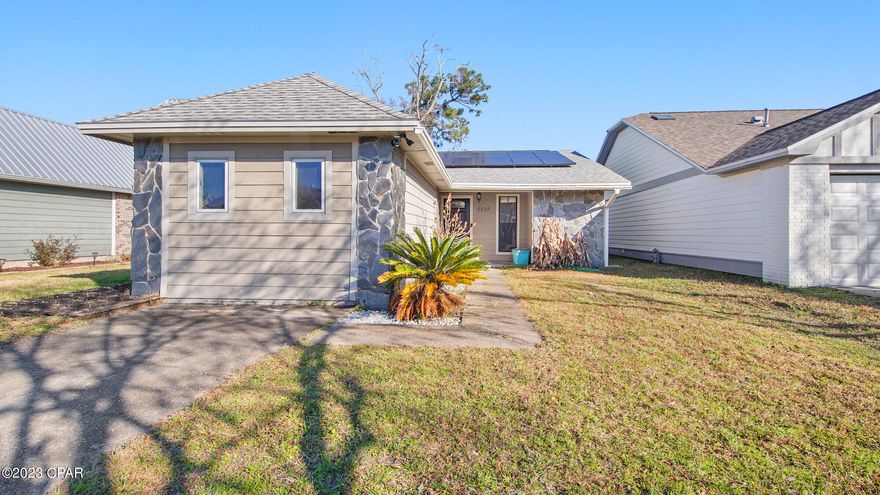 CURRENTLY UNDER CONTRACT. SELLER IS ACCEPTING BACKUP OFFERS> Welcome home to this adorable 3 bedroom, 2 bath home that is conveniently located to downtown and the beaches.  This home features a large family room with cathedral ceilings, fully equipped kitchen with stainless steel appliances and a split bedroom plan. No Carpet!! Tile throughout house! Tankless water heater also. There is a privately fenced  backyard. !  .  New roof and solar panels for low electric bills. Seller will be paying off Solar Panels! Make an appt to see this one today!!