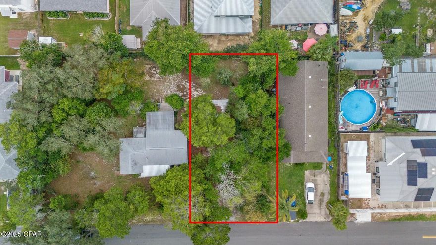 This listing is the vacant lot that is currently being split from house. This listing is just the lot itself. FANTASTIC BUILDING OPPORTUNITY ON THE HIGHLY DESIRABLE WEST END OF PCB! Just a mile from the Emerald Coast beaches, Lake Powell, and new shopping centers and dining options.