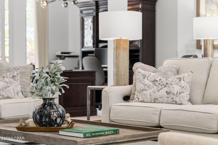 CURRENTLY UNDER CONTRACT, SELLER WILL CONSIDER BACKUP OFFERS - Contract is contingent on the sale of Buyer's home. All offers are welcome.

Welcome to 152 Hombre Circle, a custom-built 4-bedroom, 4.5-bathroom masterpiece located in The Glades, one of Panama City Beach's most prestigious neighborhoods. Situated just blocks from the world-famous white sands of the Emerald Coast, this Home Builders Association Showcase Home blends timeless elegance with modern convenience, offering an exceptional lifestyle in the heart of Panama City Beach. The kitchen, completely remodeled in 2023, is a chef's dream with marble countertops, custom cabinetry, top-of-the-line KitchenAid stainless steel appliances, and a water filtration system. The primary suite is a sanctuary of comfort with two walk-in closets, a spa-like bathroom updated in 2023, and direct access to the expansive screened-in lanai, perfect for unwinding or entertaining. Two additional downstairs bedrooms, each with their own en-suite bathrooms, provide privacy and comfort for family or guests, while the upstairs suite—with a wet bar, full bathroom, and cozy fireplace—offers versatility as a guest retreat, home office, or entertainment hub. Smart home features include Nest thermostats, a whole-house generator, and a home automation system that allows seamless control of lights and fans via an app or Alexa. The living room, complete with a fireplace and surround sound, creates a warm and inviting space for gatherings. Outside, the private backyard is bordered by conservation land for added tranquility and features a resurfaced pool with a new filtration system (2023), ensuring a serene outdoor oasis. Additional upgrades include a new roof (2019), hurricane-protective window film, fresh exterior paint (2024), and new interior paint and LVP flooring (2023), all contributing to the home's impeccable condition and modern aesthetic. A 50-amp RV plug and floored attic storage further enhance the property's functionality. Perfectly positioned near premier shopping, dining, and attractions, including Duplin Winery and local golf courses, this home offers unparalleled access to the best of Panama City Beach. Whether you're drawn to its sophisticated interior, private outdoor retreat, or prime location, 152 Hombre Circle invites you to experience the pinnacle of Emerald Coast living. Schedule your private tour today to make this stunning home your own.