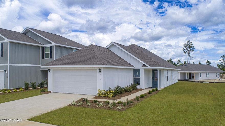 New construction home in Liberty, located in Panama City. This Celeste floor plan is located at 6616 Kettles Street. As you enter this home you will notice the bright entry way afforded by the prairie door.  This 3-bedroom 2-bathroom, 1403 square foot home is an open concept floorplan.  The primary bedroom and bathroom are located off the entry at the front of the home.  The primary bathroom has double sink vanity, large shower, and a huge closet.  Proceed down the entry hallway passing the laundry area as you enter into the kitchen, dining, and family area.  The kitchen offers a breakfast bar with space for seating.  On the opposite side of the home from the primary bedroom upfront, there are two spacious secondary bedrooms separated by a shared bathroom.  This home includes standard appliance package that includes a smooth top range, dishwasher and microwave as well as design features; EVP flooring, granite countertops and bright white cabinetry.  Liberty neighborhood is conveniently located in beautiful Panama City off Star Avenue near 231. Located just 25 minutes from Tyndall Airforce Base, 20 minutes to hospitals, and less than 15 minutes to shopping, restaurants, and grocery stores you will be amazed at the convenience once you enter the winding entrance to this beautiful sanctuary. Liberty, D.R. Horton's premier new lifestyle community, offers a 7,500 square foot community center with full gym, wellness rooms and much more. Additionally, behind the community center is a water wonderland with resort style pool, splash pads, and an outdoor grilling kitchen with seating.